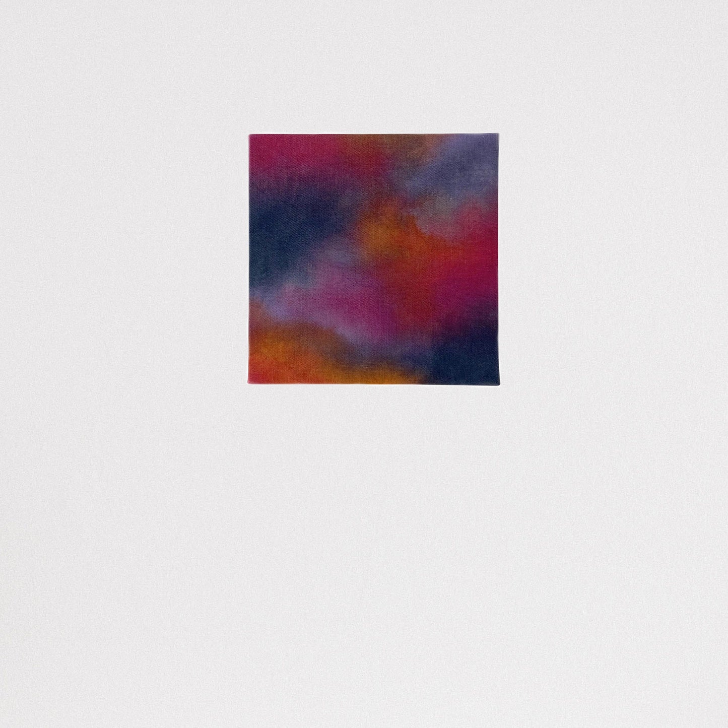 Abstract cloud painting in shades of pink, peach and purple.