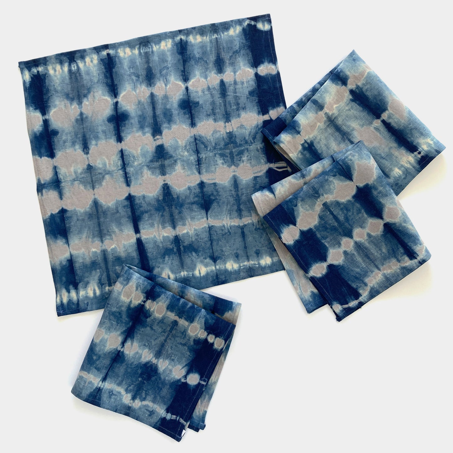 Silver gray linen napkins, set of four, dyed with indigo in Pleat pattern. Sustainably hand-dyed in small batches and sewn in New York City.