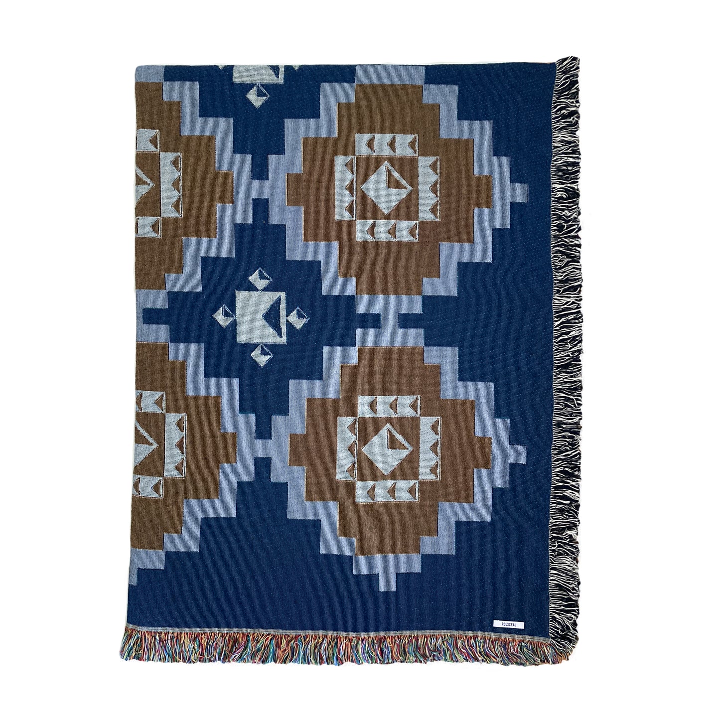 A navy and ochre geometric patterned woven cotton throw with fringe edge, displayed on a white background.