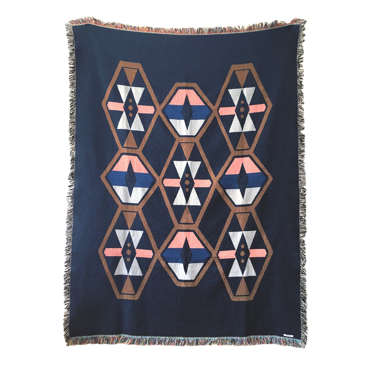 Twilight navy geo woven throw with fringe edge. Woven with recycled cotton on a jacquard loom, made in the US. Each throw measures 54 x 72 inches.