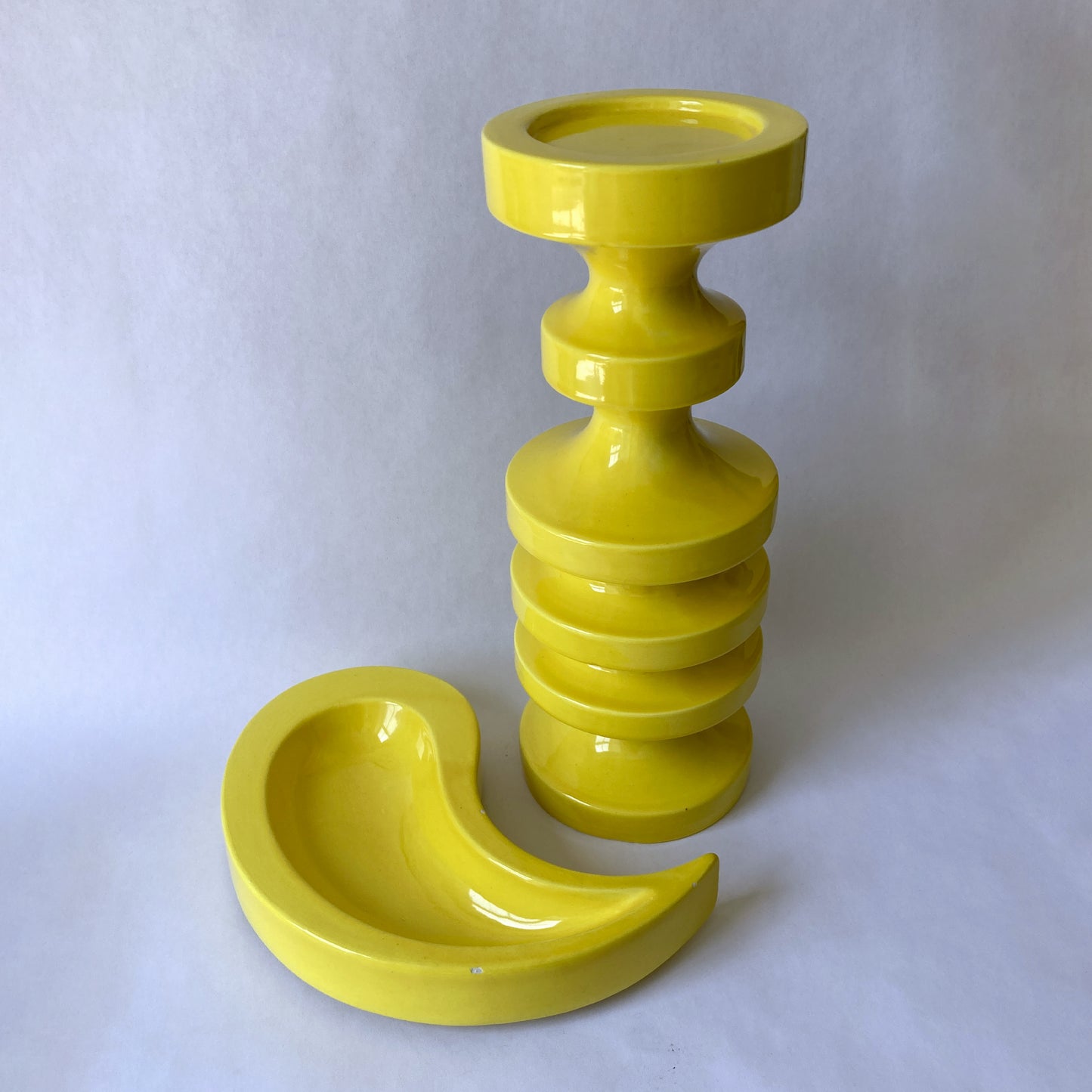 A stunning rare abstract Haeger bright canary yellow sculpture/ object. This piece coordinates with a catchall in the same color, listed separately, see photos.