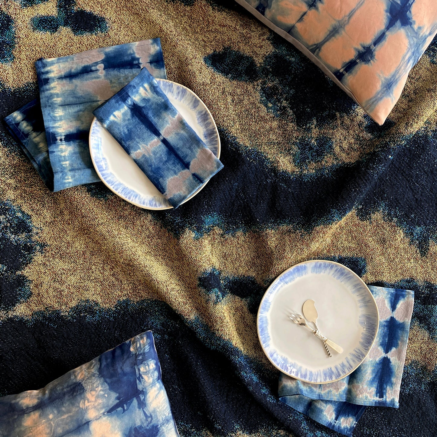 A tablescape of gold, rose, silver and indigo.
