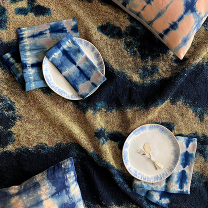 A tablescape of gold, rose, silver and indigo.