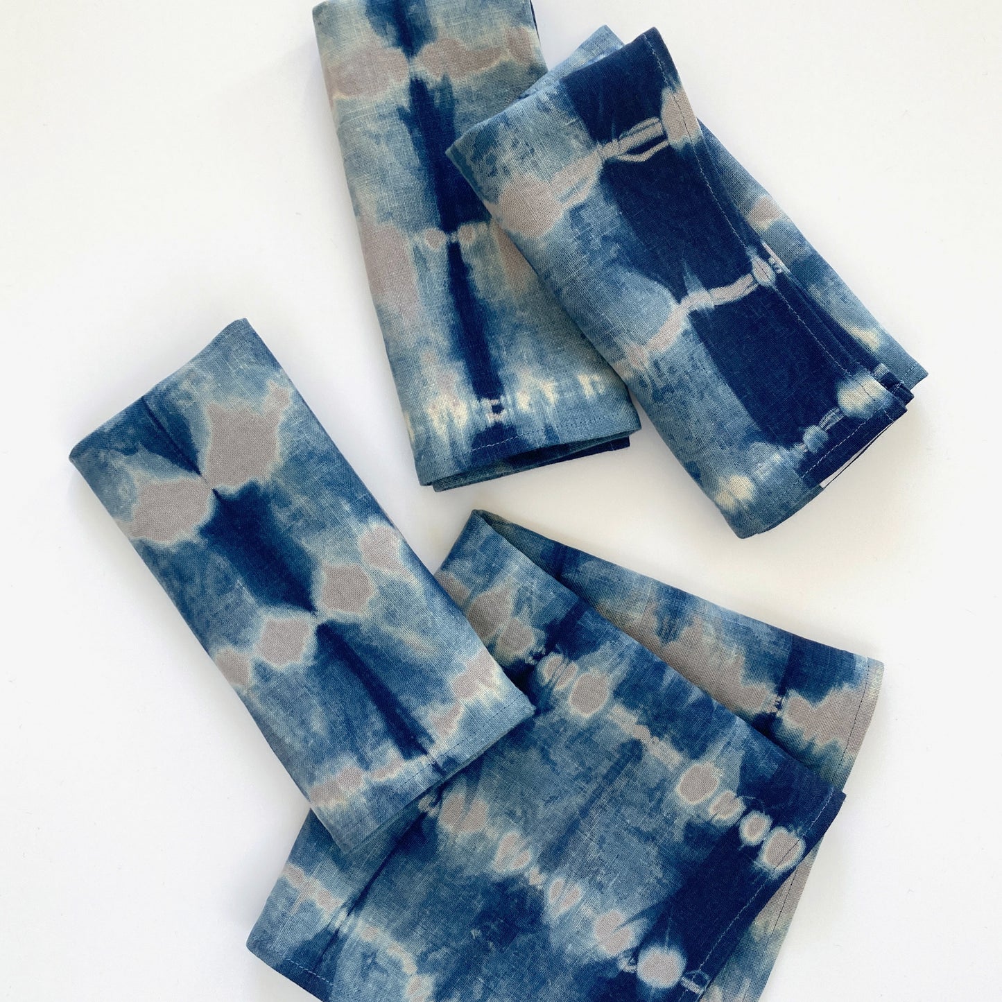 Silver gray linen napkins, set of four, dyed with indigo in Pleat pattern. Sustainably hand-dyed in small batches and sewn in New York City.