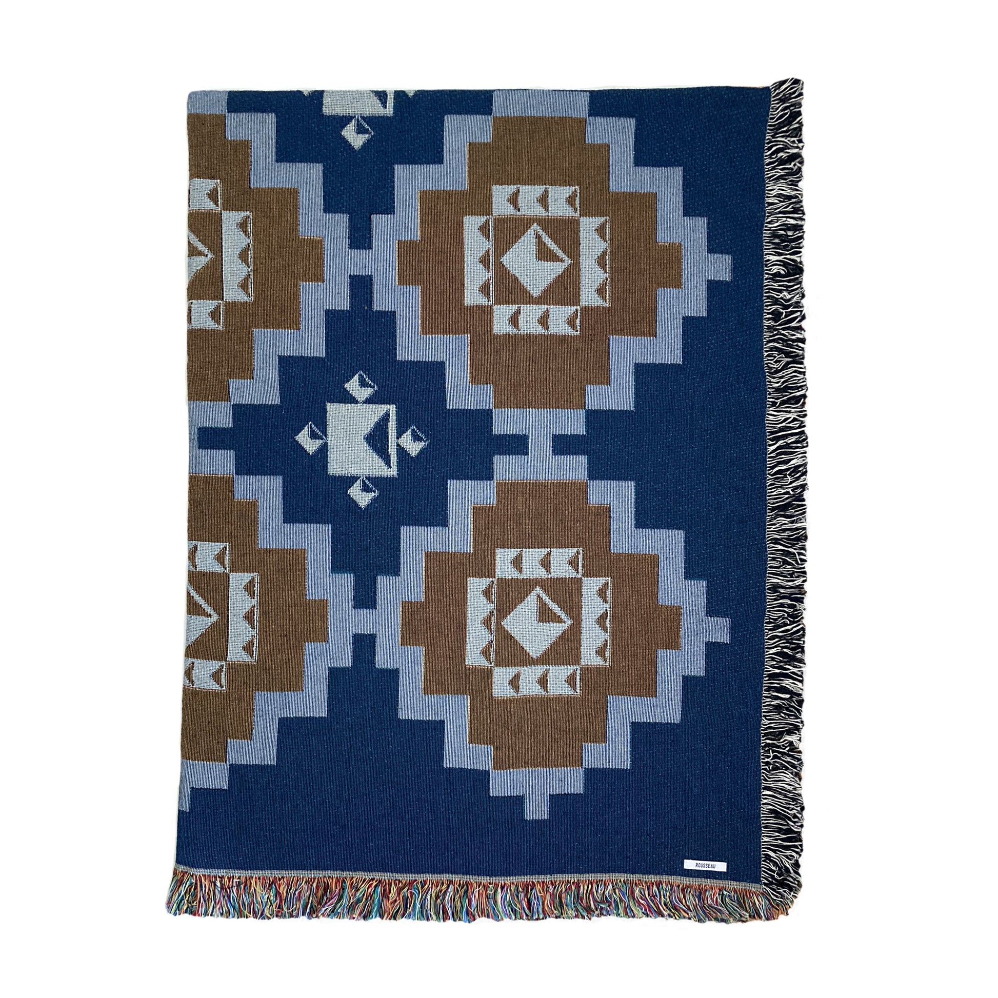 A navy and ochre geometric patterned woven cotton throw with fringe edge, displayed on a white background.