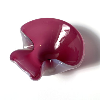 Stunning, unique Venetian hand blown bowl/ catchall. Beautiful cranberry pink interior with opal exterior, creating a luminous mauve shade. 