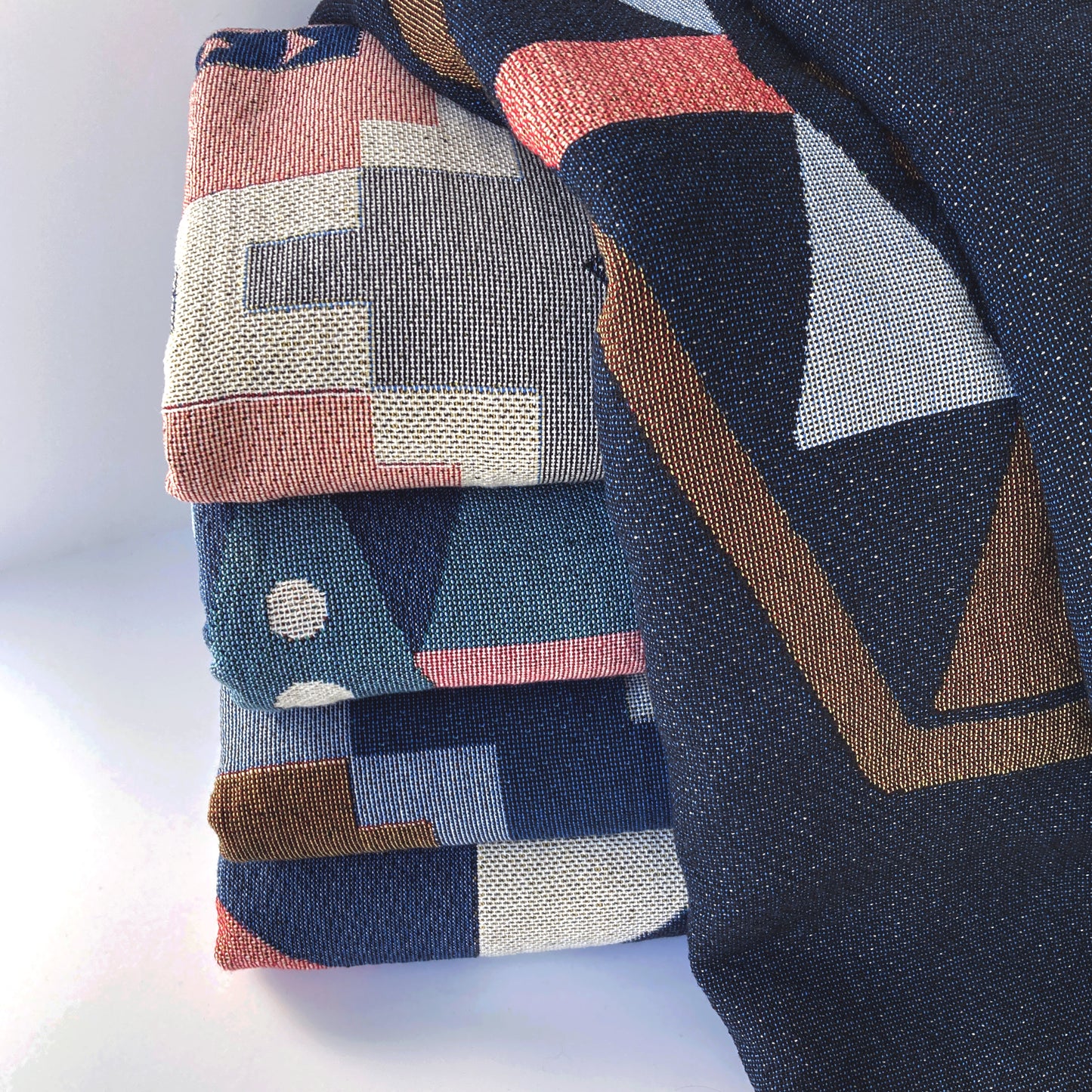 Group of geometric throw blankets