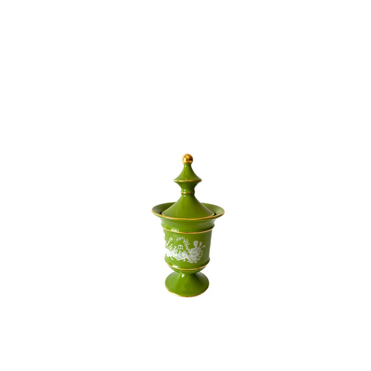Beautiful Italian moss green and gold round lidded ceramic jar/ urn. The green shade contrasts beautifully with the gold accents and white pattern that wraps around the piece. The petite size makes this piece versatile, this piece looks great as part of a group, or independently on a dresser or side table. Signed: Hand Made in Italy, Florentine, 7.