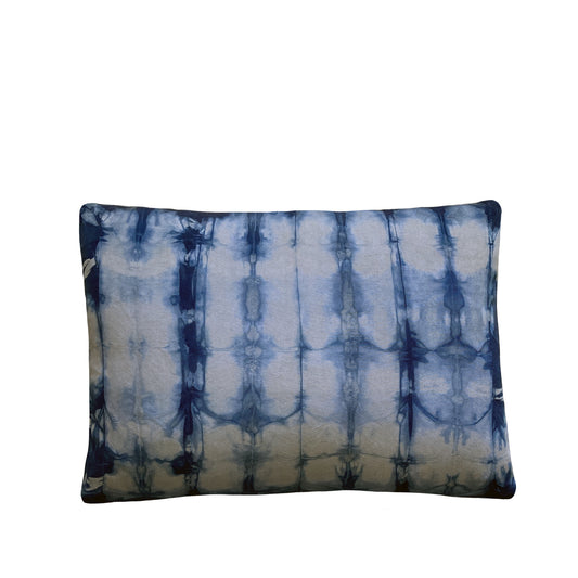 Silver gray silk pillow dyed with indigo, in abstract ripple pattern.